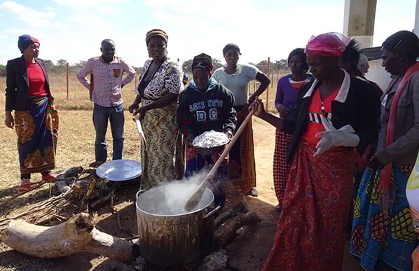 Zambian women making soap